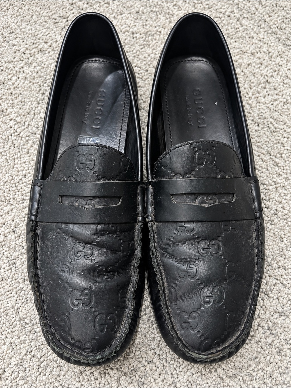 Gucci Black GG Embossed Leather Penny Loafers